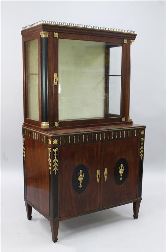 A Swiss parcel ebonised ormolu mounted mahogany vitrine, W.2ft 10in. D.1ft 9in. H.5ft 2in.